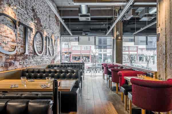 Modern restaurant Arabia in Ravintolasali with exposed brick, ideal for networking events.