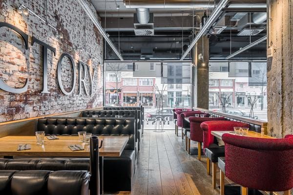 Modern restaurant Arabia in Ravintolasali with exposed brick, ideal for networking events.
