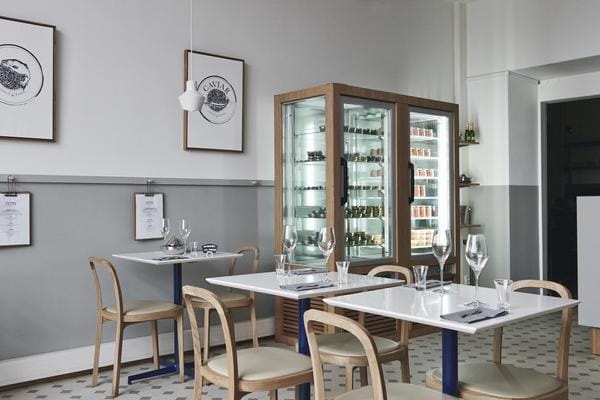 Sleek modern dining space in Brofelt, Salutorget for intimate gatherings and meetings.