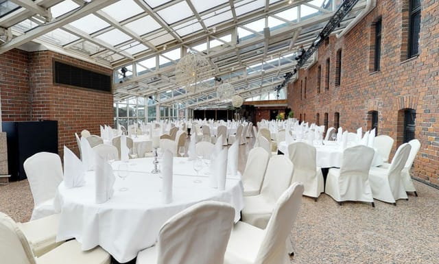 Elegant dining area at Talvipuutarha, ideal for corporate events and galas.