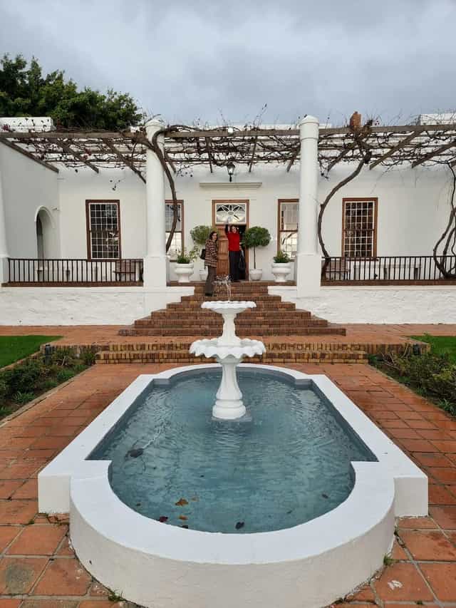 Elegant outdoor venue with fountain, ideal for upscale events and celebrations in Welgemeend.