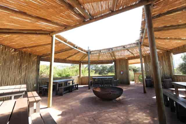 Rustic open venue at Intaka Island for casual gatherings and team-building retreats.