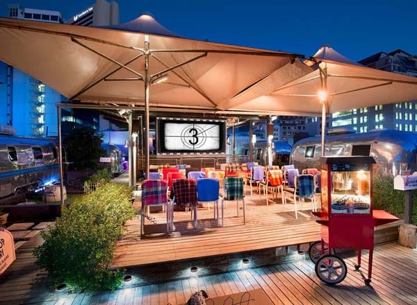Sky Bar rooftop venue with colorful seating for casual corporate events and gatherings.