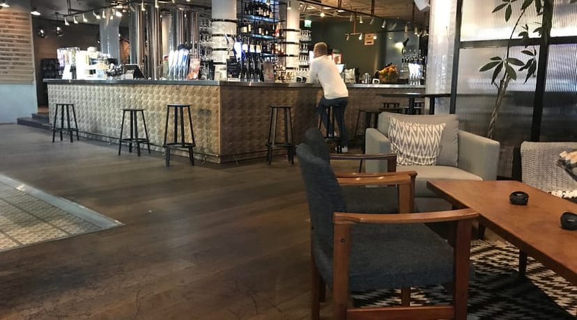 Modern bar area in VENN's Main Restaurant, perfect for networking events and gatherings.