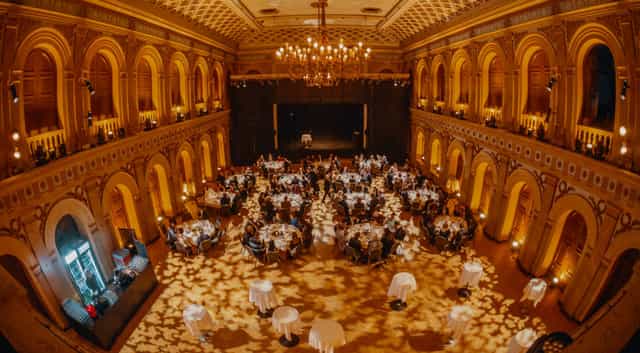 Elegant gala dinner setup in Music Hall, The Old Student House, ideal for upscale events.