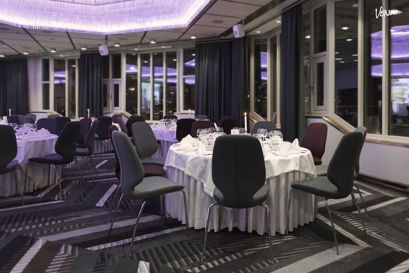 Elegant ballroom setup at Hilton Helsinki Strand for intimate corporate events.