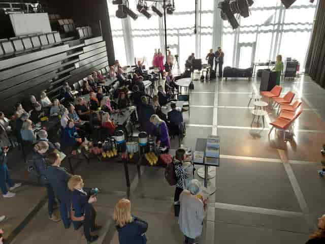 Maijansali Hall at Oodi, a professional event space for networking and presentations.