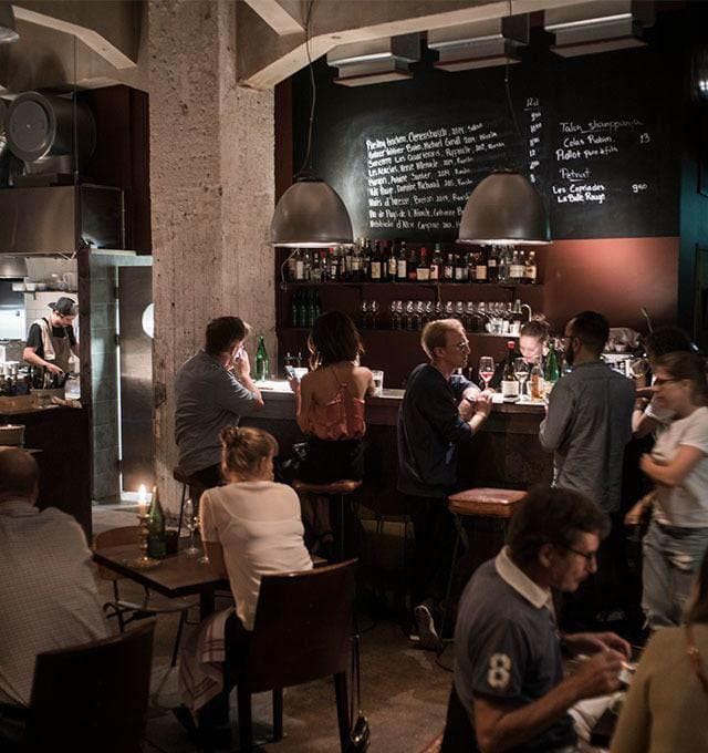 Vibrant bistro venue with cozy seating, perfect for informal meetings and events.