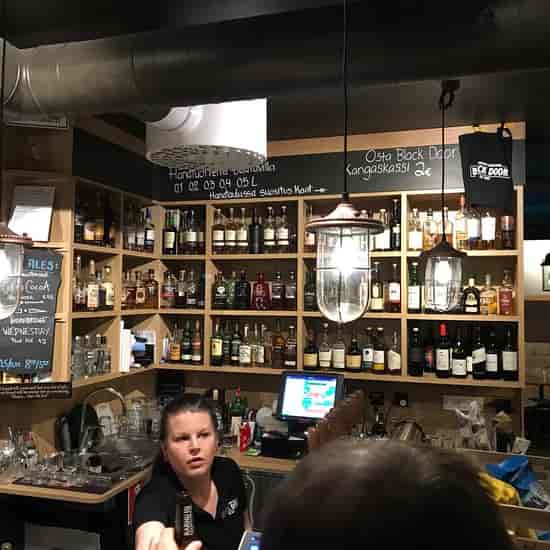 Beer garden bar in Blackdoor: cozy ambiance for networking and post-event socializing.