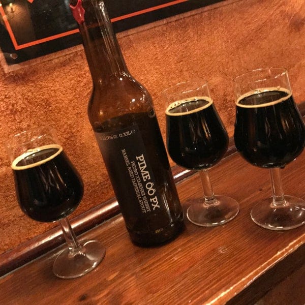 Craft beer in elegant glasses at Blackdoor beer garden for social gatherings.
