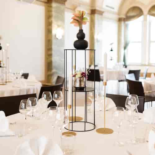 Elegant Rake Ballroom dining setup at Klaus K Hotel for formal events and corporate gatherings.