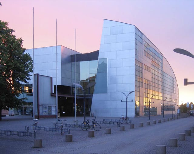 Modern event venue at Kiasma, featuring sleek design and ideal for gatherings.