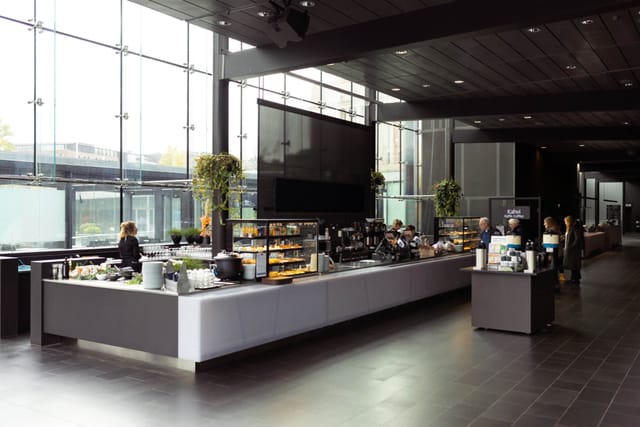 Modern café setup in Musiikkitalo, ideal for networking and conferences.