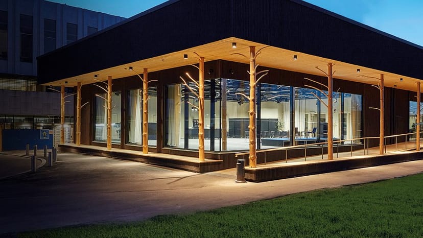 Little Finlandia event space with large windows and modern design, perfect for gatherings.