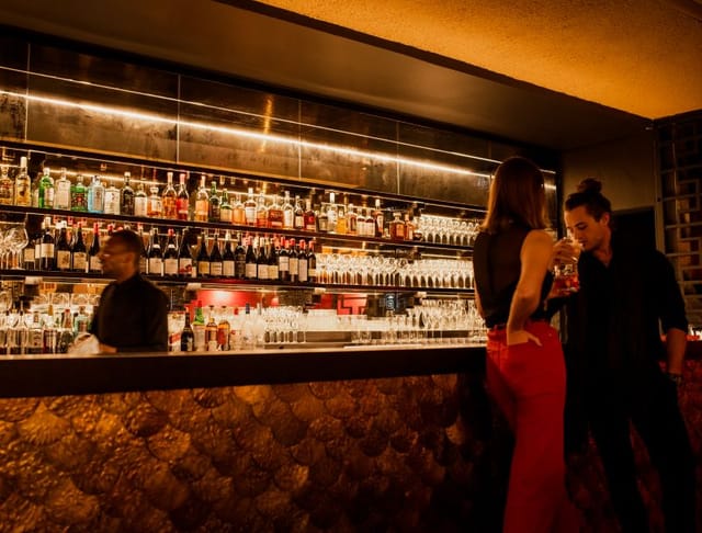 Stylish bar in The Red Room, perfect for cocktail receptions and networking events.