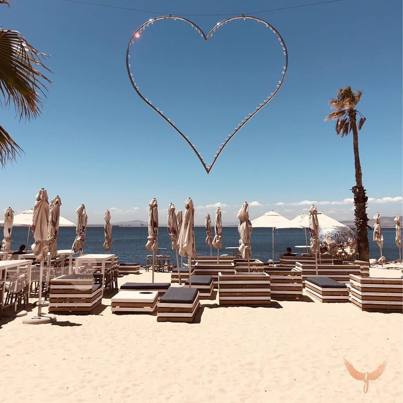 Ocean-view decks at Grand Africa Café with romantic decor for weddings and events.