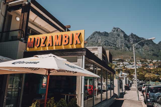 Mozambik Restaurant outdoor seating with mountain view, ideal for events and gatherings.