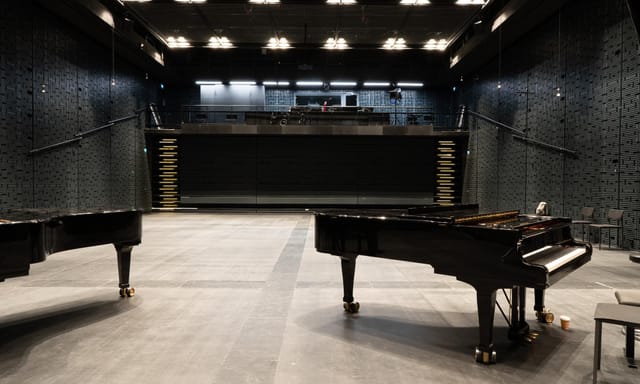 Large Recording Room at Uniarts Helsinki with grand pianos for music events and rehearsals.