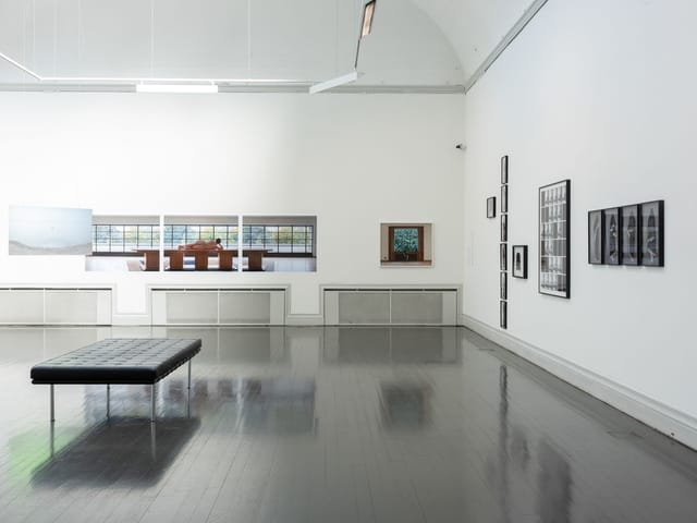 Modern art exhibition gallery in Kunsthalle Helsinki with polished flooring.