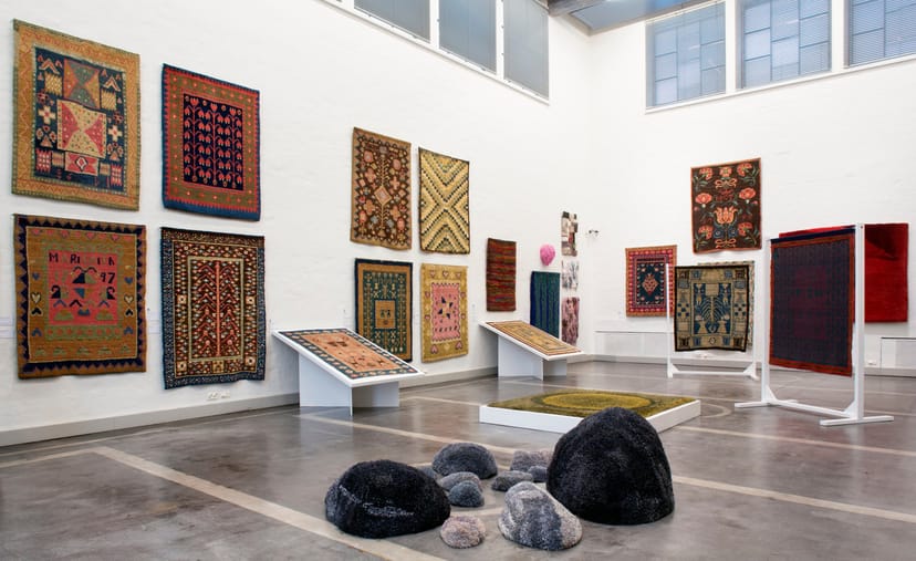 Kunsthalle Helsinki exhibition gallery with vibrant textile art, ideal for creative events.