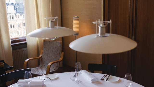 Elegant dining setup in Savoy's private room for corporate events and intimate dinners.