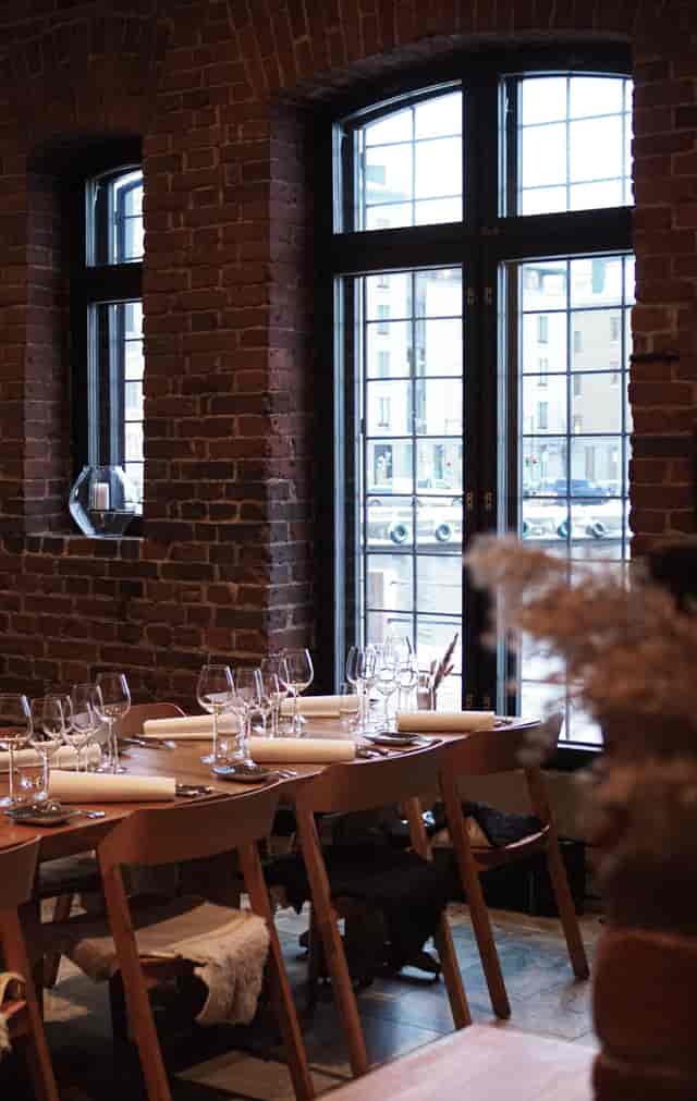 Stylish dining setup at Kokka-keittiö, perfect for networking dinners and celebrations.