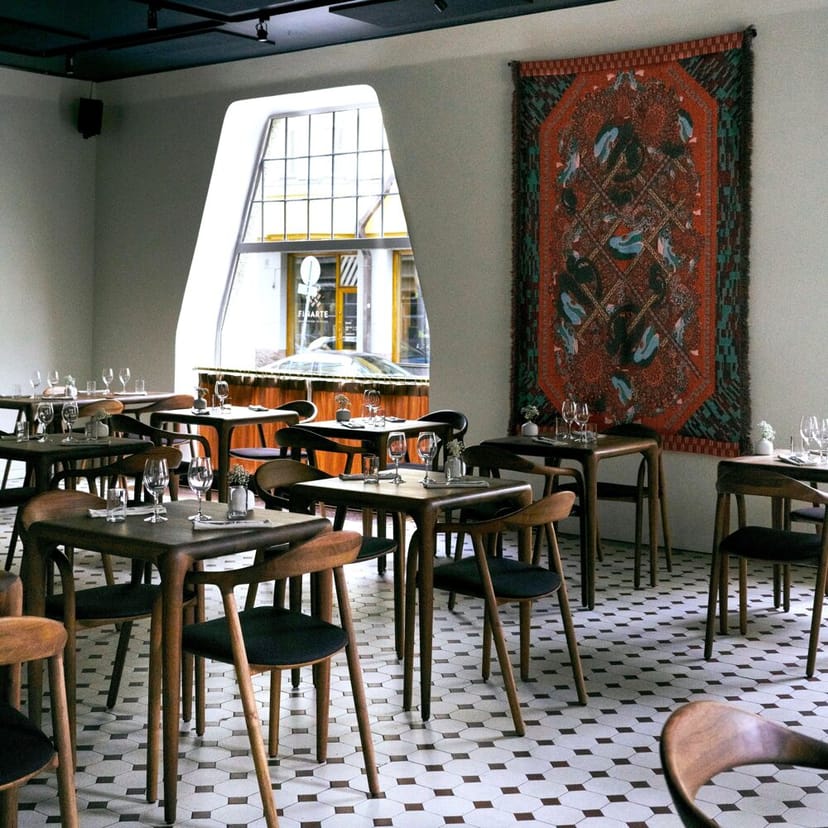 Stylish restaurant setup with elegant decor for corporate meetings or private gatherings.