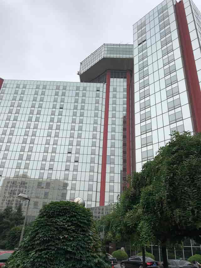 Atrium, The Great Wall Hotel Beijing, modern glass façade, corporate events venue