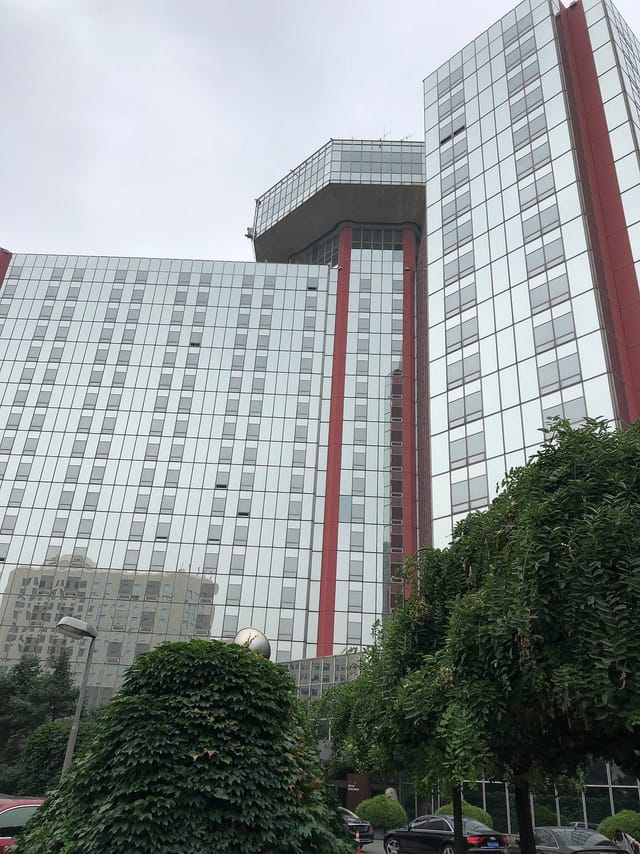 Atrium, The Great Wall Hotel Beijing, modern glass façade, corporate events venue