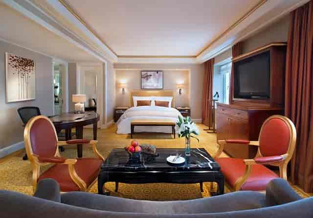 Luxurious St. Regis Beijing suite with elegant furnishings for VIP meetings and events.