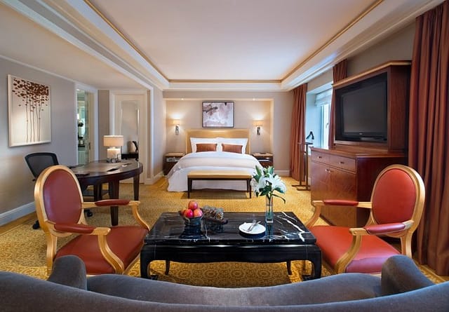 Luxurious St. Regis Beijing suite with elegant furnishings for VIP meetings and events.