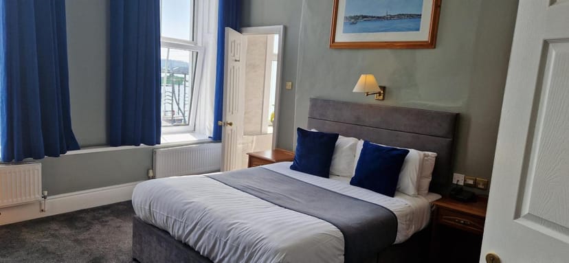 Harbour Suite at Commodore Hotel: modern decor for event accommodation.