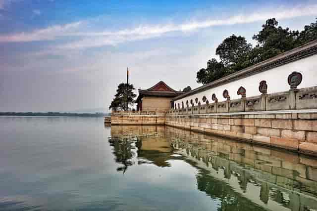 "Elegant conference room with serene waterfront views for retreats and team-building events."