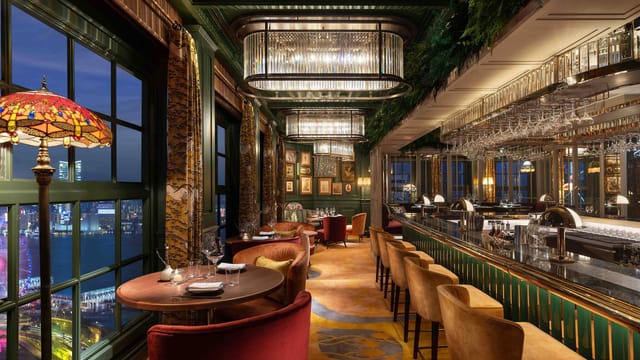 The Connaught Room in Hong Kong: elegant dining space with stunning views for upscale events.