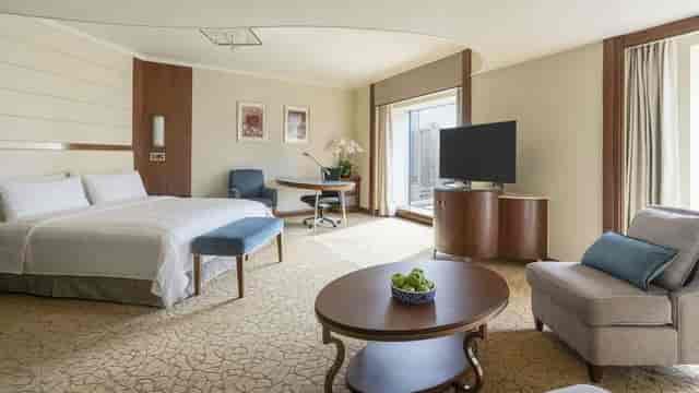 Meeting room at China World Hotel, Beijing with modern furnishings for events.