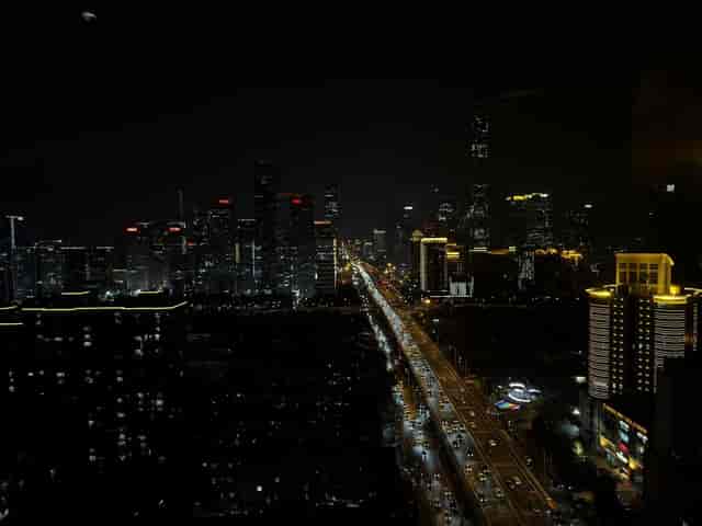 "VIP Room Renaissance Beijing with skyline view, ideal for corporate events and dinners."