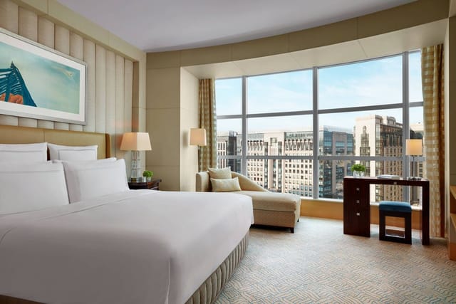 Luxurious hotel room in Ritz-Carlton Beijing, ideal for business meetings and events.