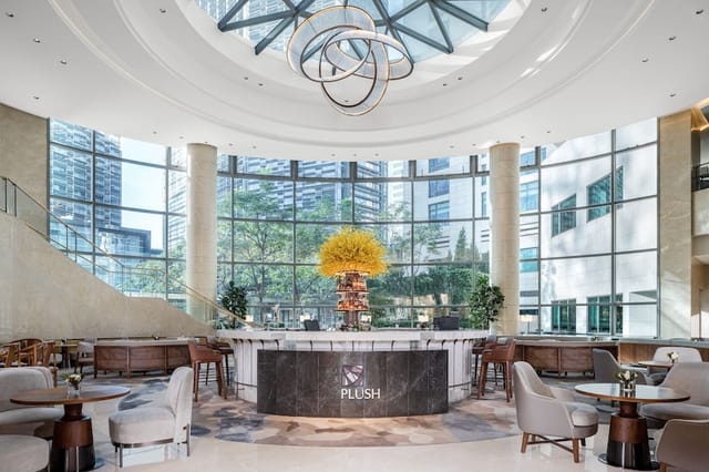 Ornate meeting suite in Westin Beijing, elegant decor with floral arrangement, ideal for events.