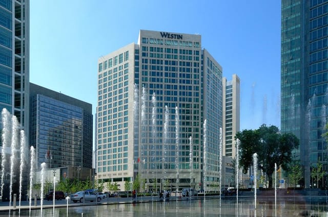 Chic Westin Beijing hotel facade, ideal for corporate events and meetings in high-rise setting.