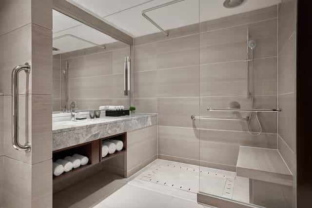 Accessible modern bathroom at JW Marriott Hotel Beijing Central for events and comfort.