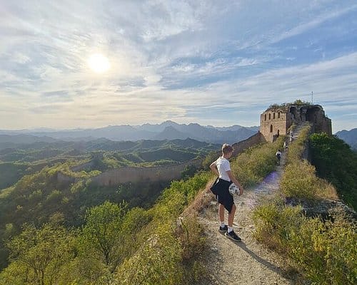 Hiking area in Beijing Zoo with Great Wall backdrop, perfect for team-building events.