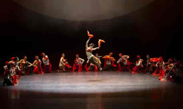 Performance Hall in Beijing Dance Academy with vibrant dancers for cultural events.
