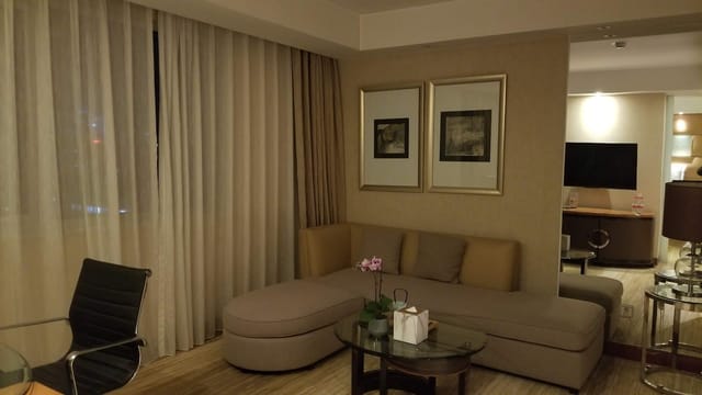 Well-appointed suite at Gehua New Century Hotel for intimate meetings and events.