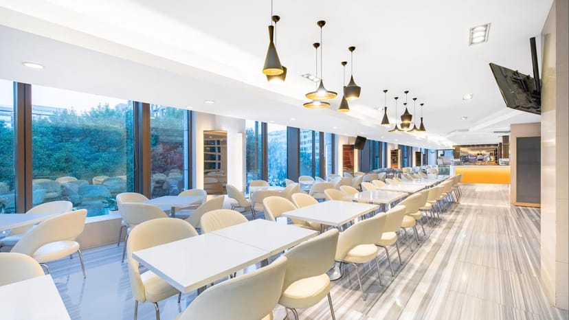 Grand Banquet Hall at Holiday Inn Beijing, modern event space with natural light, ideal for meetings.