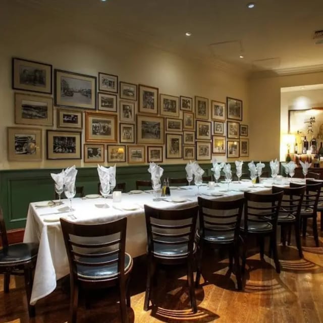 Elegant dining setup in Green Room, ideal for corporate events and private dinners.