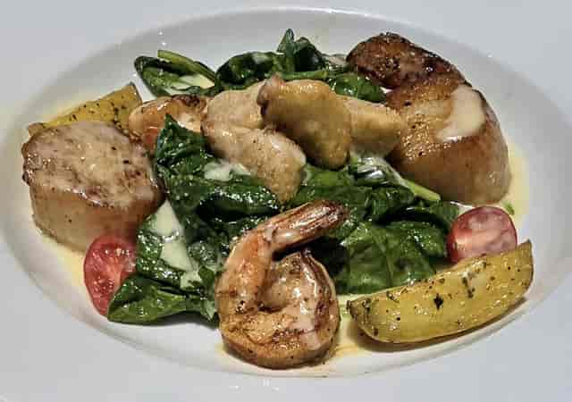 Gourmet seafood salad with scallops at Mistral Restaurant & Bar for upscale events.