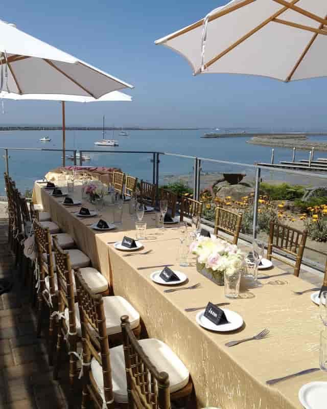 Harbor View Room at Sam's Chowder House, elegant table setup for waterfront weddings.