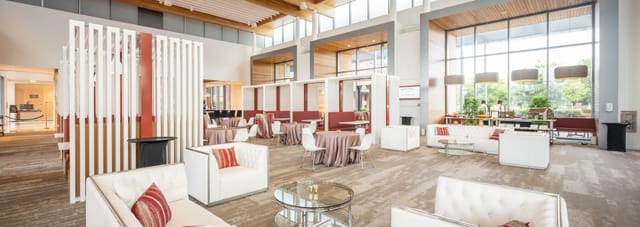Modern Stanford Redwood City Conference Center with flexible event space and stylish seating.