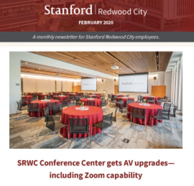 Corporate event space with round tables and red tablecloths in Stanford Redwood City.