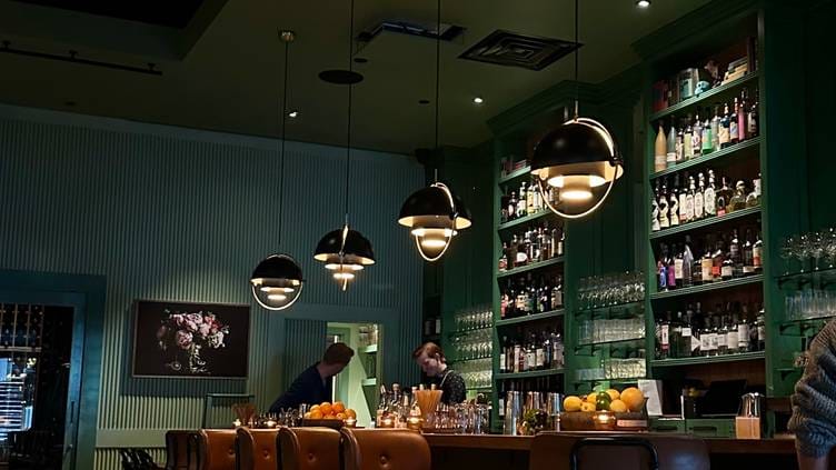 Stylish BarZola bar setup with vibrant lighting for networking events and cocktail receptions
